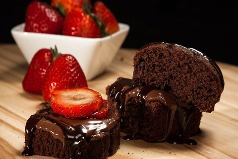 slices of chocolate cake with strawberries